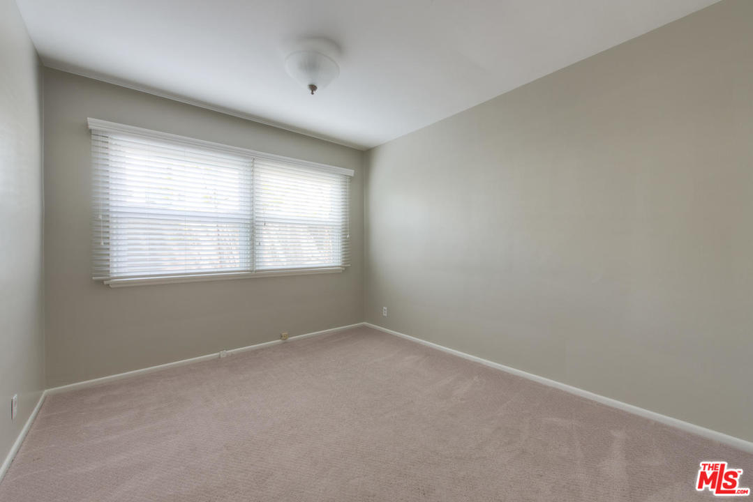 4739 Libbit Avenue Encino, CA 91436 - Photo 11 of 23 an empty room with a window