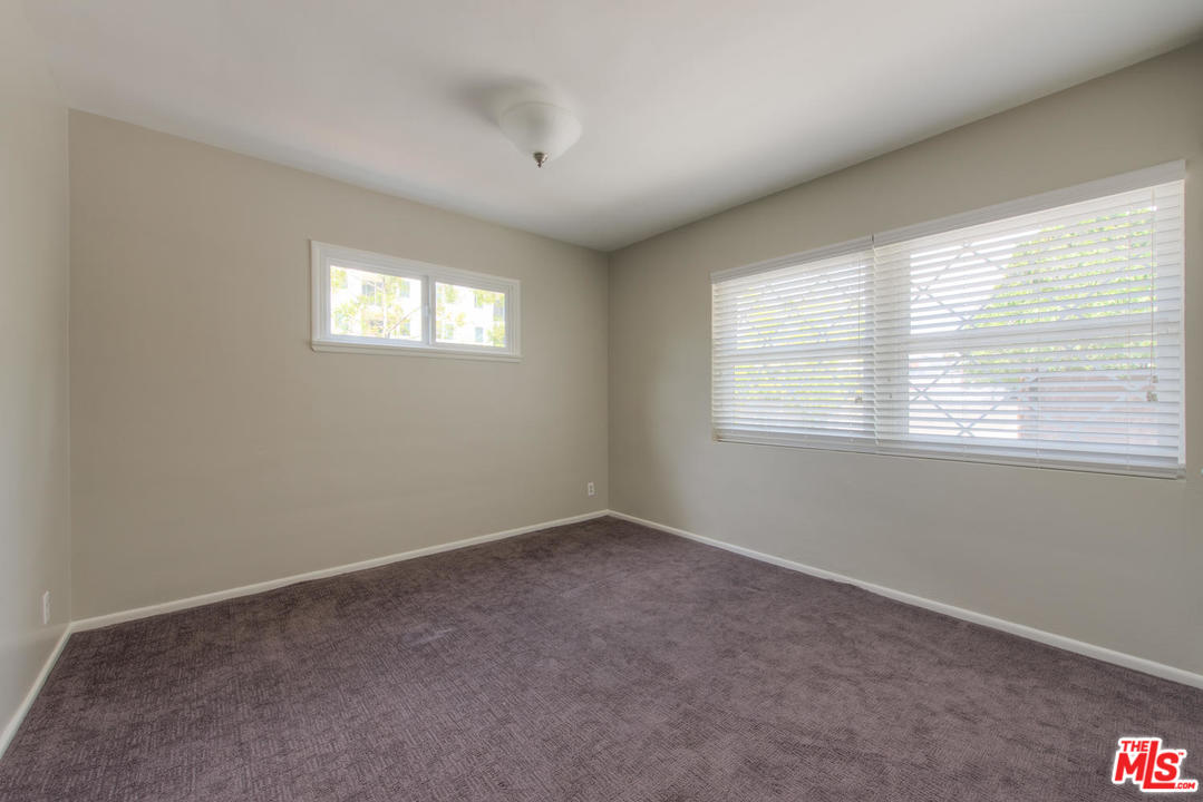 4739 Libbit Avenue Encino, CA 91436 - Photo 12 of 23 an empty room with a window