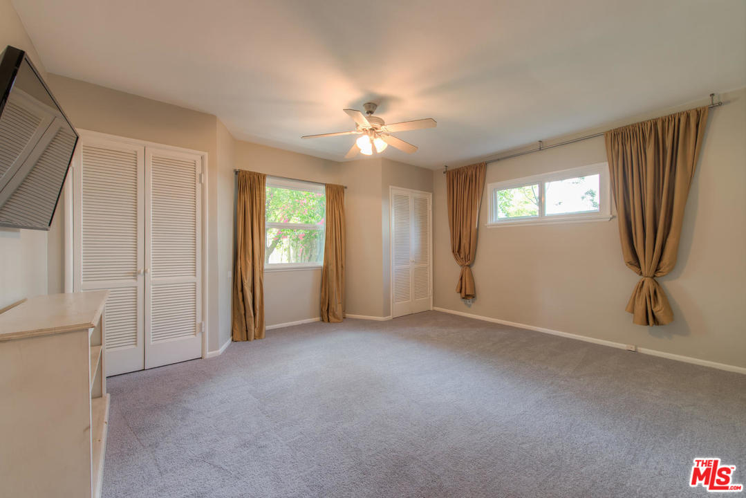 4739 Libbit Avenue Encino, CA 91436 - Photo 14 of 23 a view of an empty room with a window