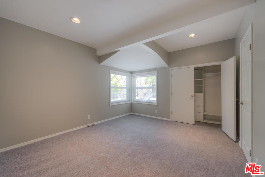4739 Libbit Avenue Encino, CA 91436 - Photo 15 of 23 an empty room with windows