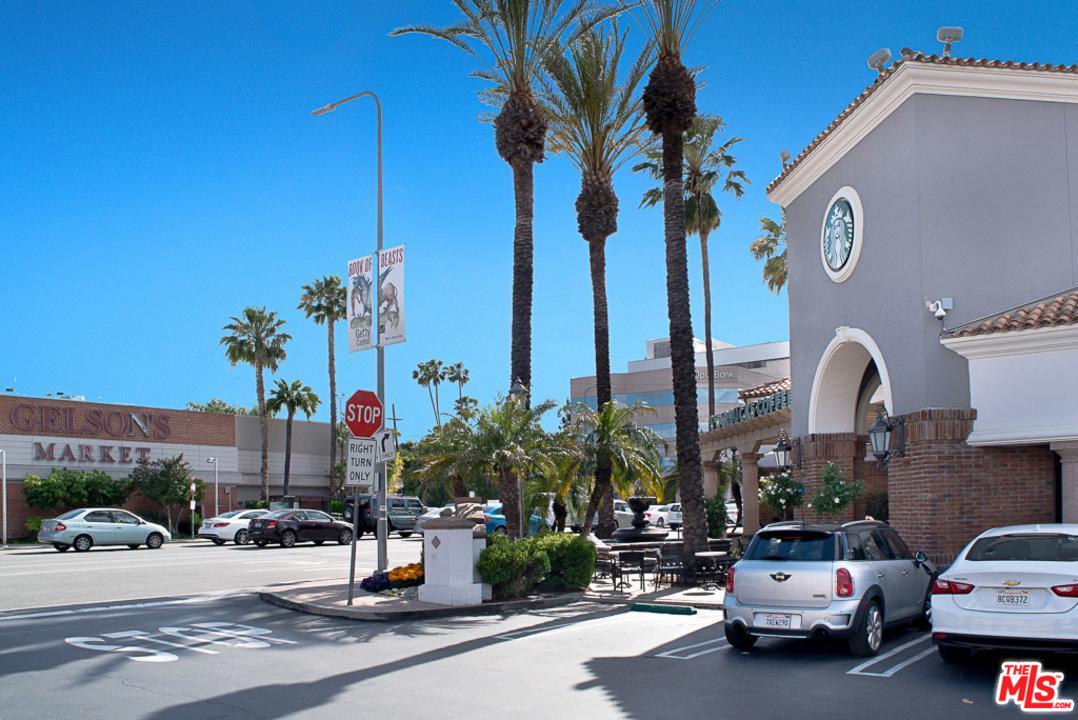 4739 Libbit Avenue Encino, CA 91436 - Photo 22 of 23 a cars parked in front of a house