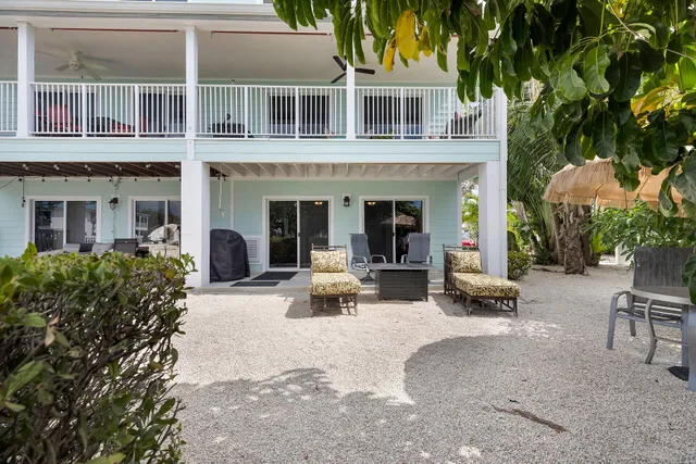 a room with furniture and a book shelf