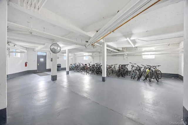 a view of a studio with lots of gym equipment