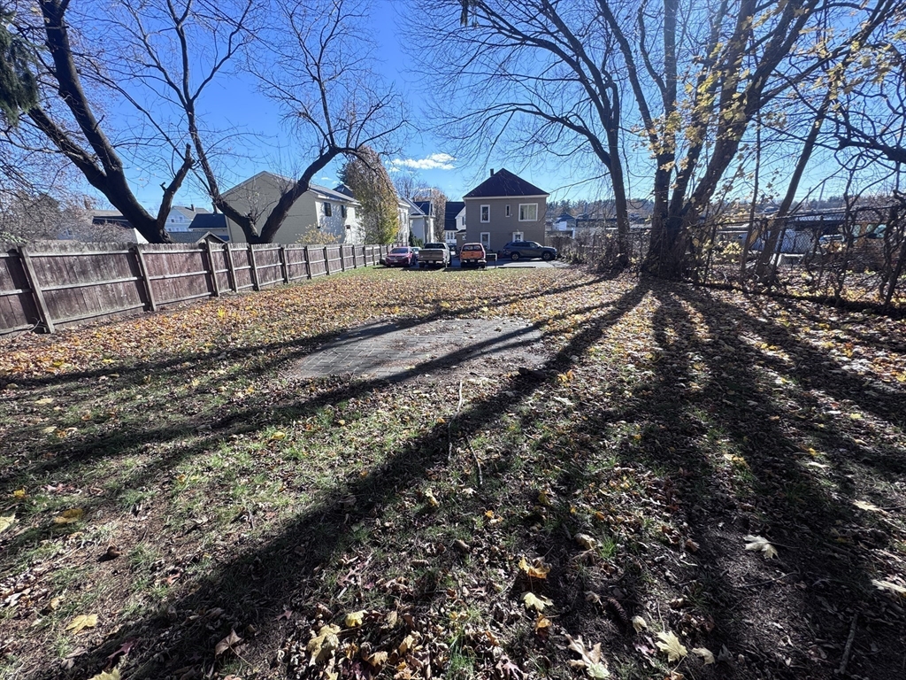 116-118 Lawrence Street, Unit 1REAR Clinton, MA 01510 - Photo 13 of 13 a view of a house with a yard