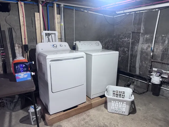 a utility room with dryer and washer