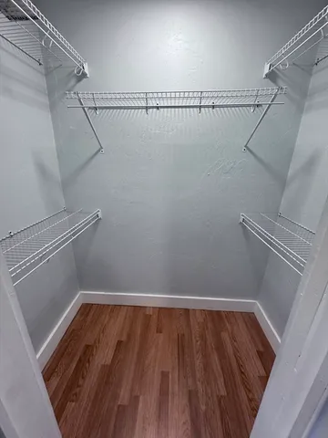 a view of a room with racks on the wall