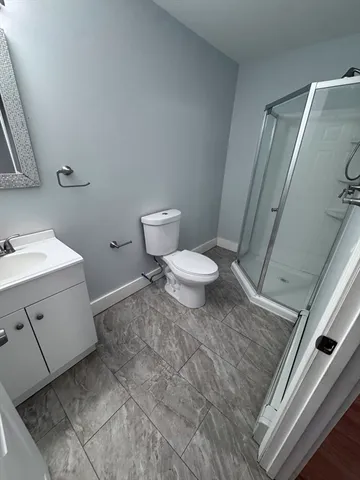 a car parked in front of a house