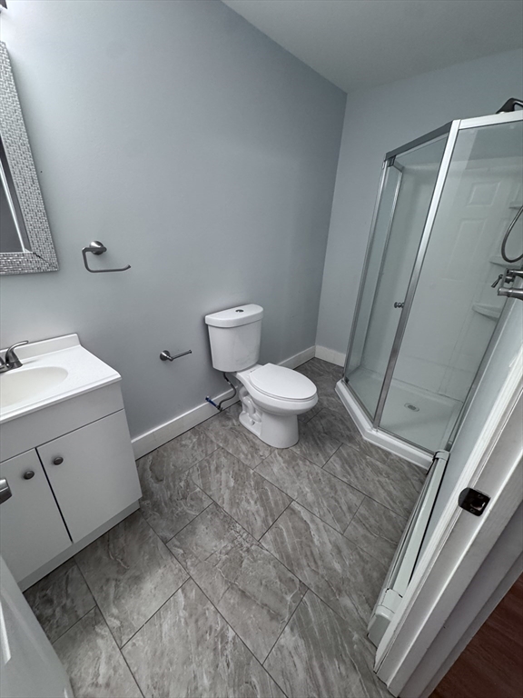 116-118 Lawrence Street, Unit 1REAR Clinton, MA 01510 - Photo 9 of 13 a bathroom with a toilet and a sink