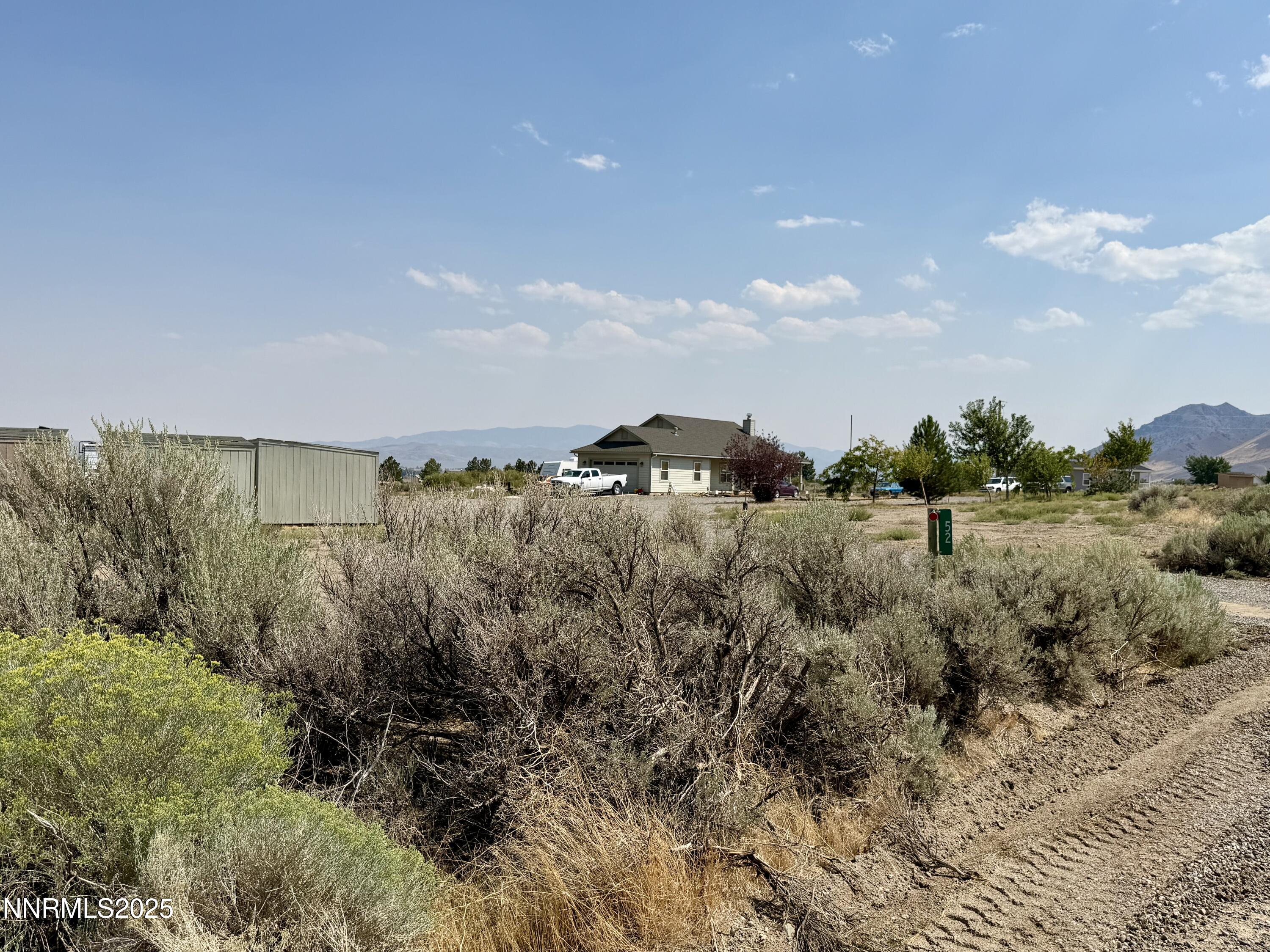 52 Upper Colony Road Wellington, NV 89444 - Photo 19 of 21 a view of a houses and green field