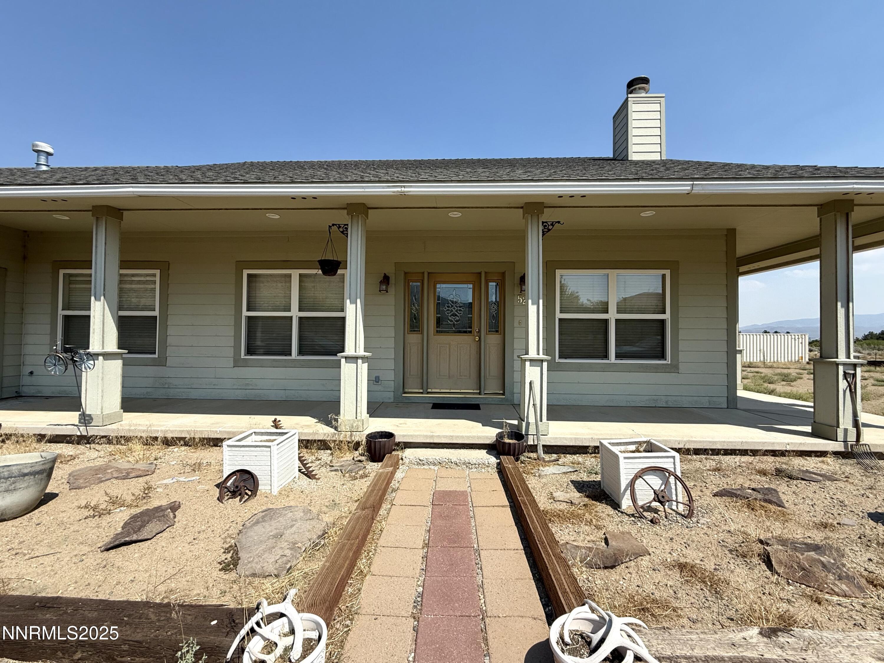 52 Upper Colony Road Wellington, NV 89444 - Photo 2 of 21 a view of a house with a outdoor space