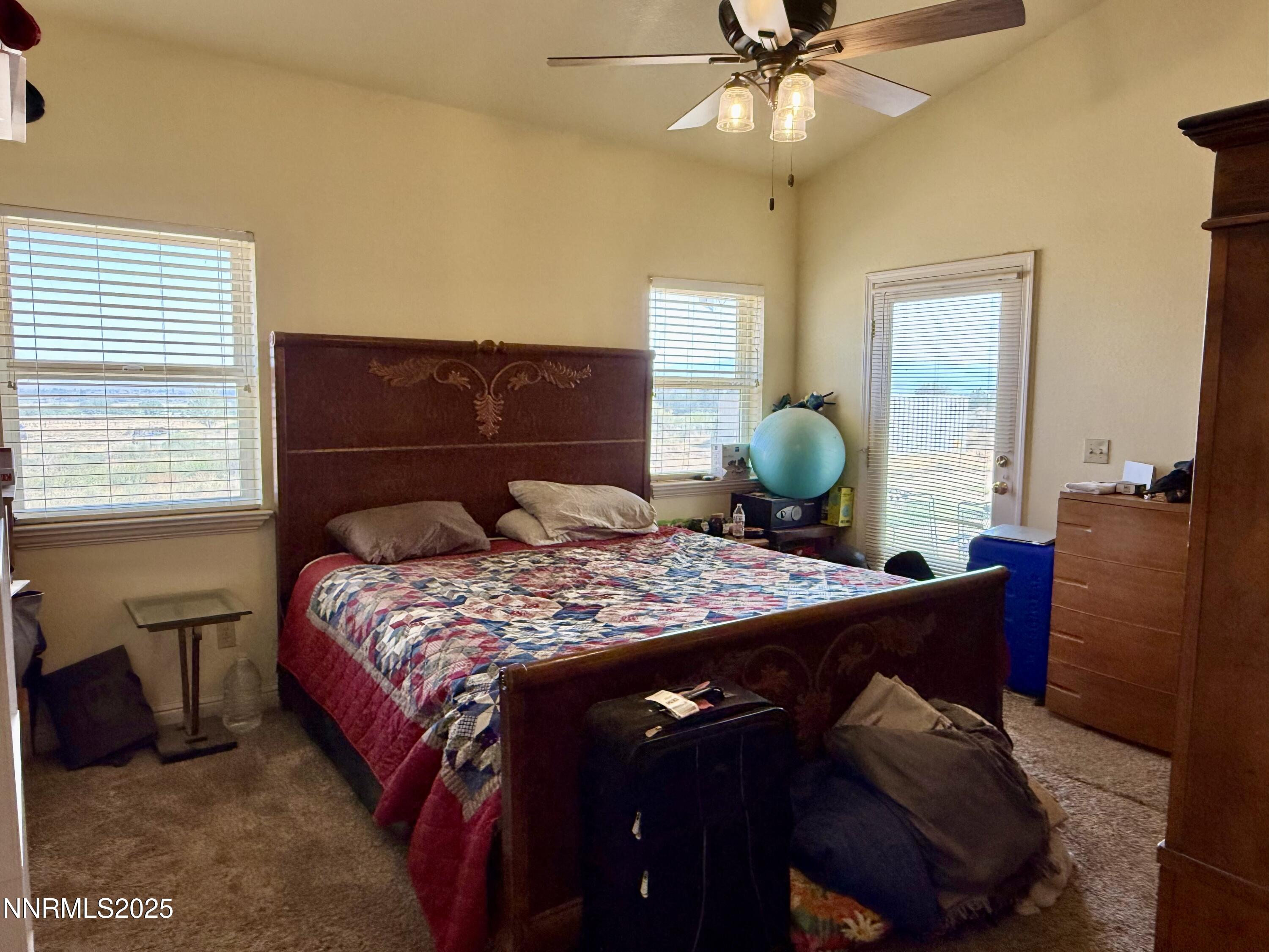 52 Upper Colony Road Wellington, NV 89444 - Photo 8 of 21 a bedroom with a bed and window