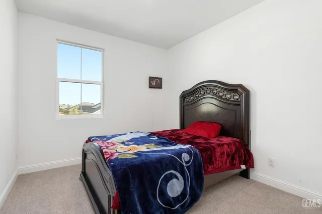 a view of a porch with wooden floor and stairs