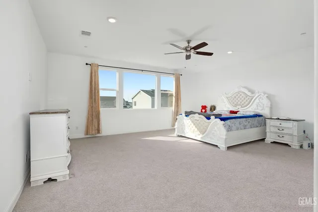 a bathroom with a sink a mirror and a shower