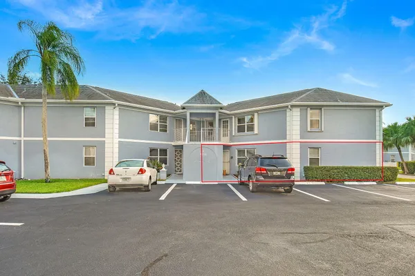 a car parked in front of a house