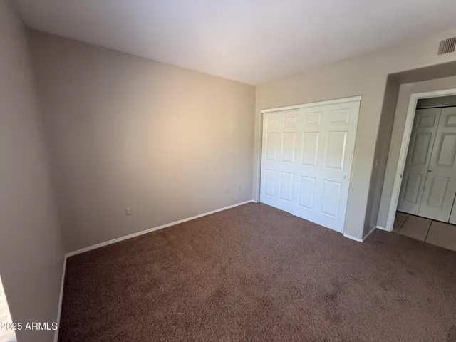 an empty room with closet