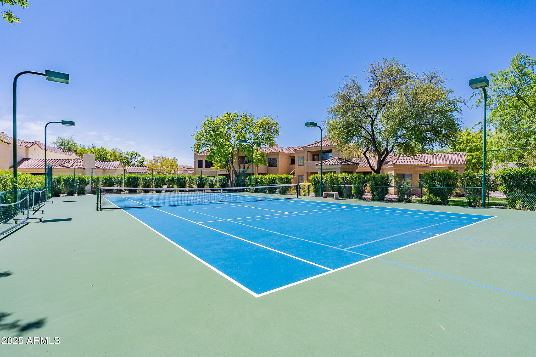 7575 East Indian Bend Road, Unit 2124 Scottsdale, AZ 85250 - Photo 26 of 32 a view of a tennis court