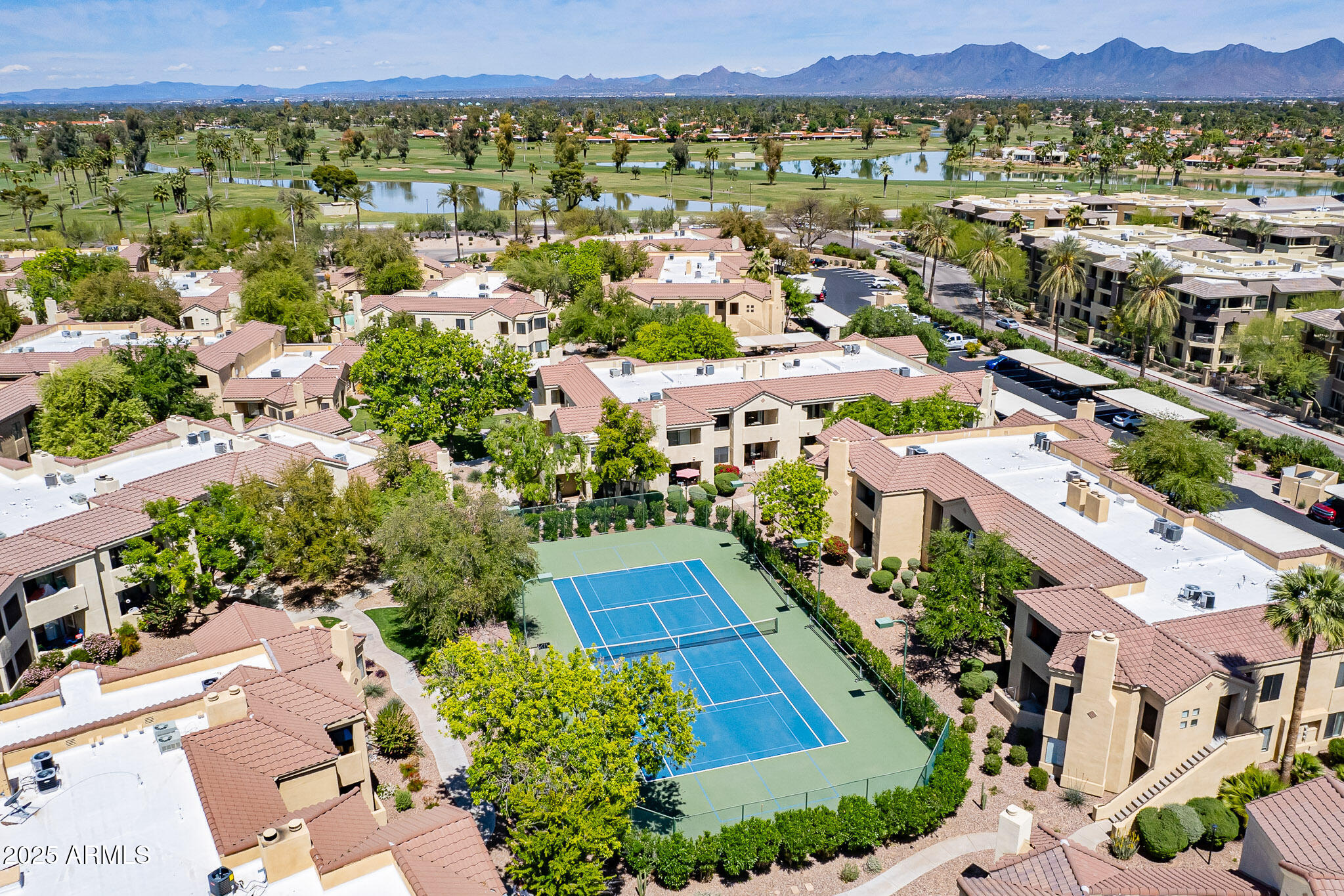 7575 East Indian Bend Road, Unit 2124 Scottsdale, AZ 85250 - Photo 29 of 32 an aerial view of residential houses with outdoor space