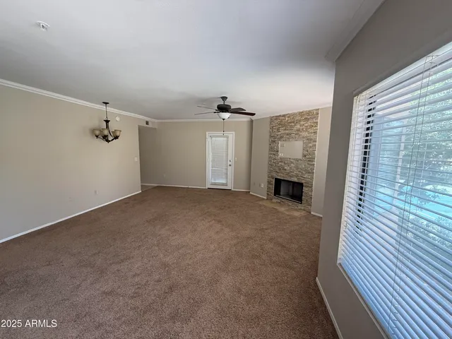 a view of a livingroom with a fireplace