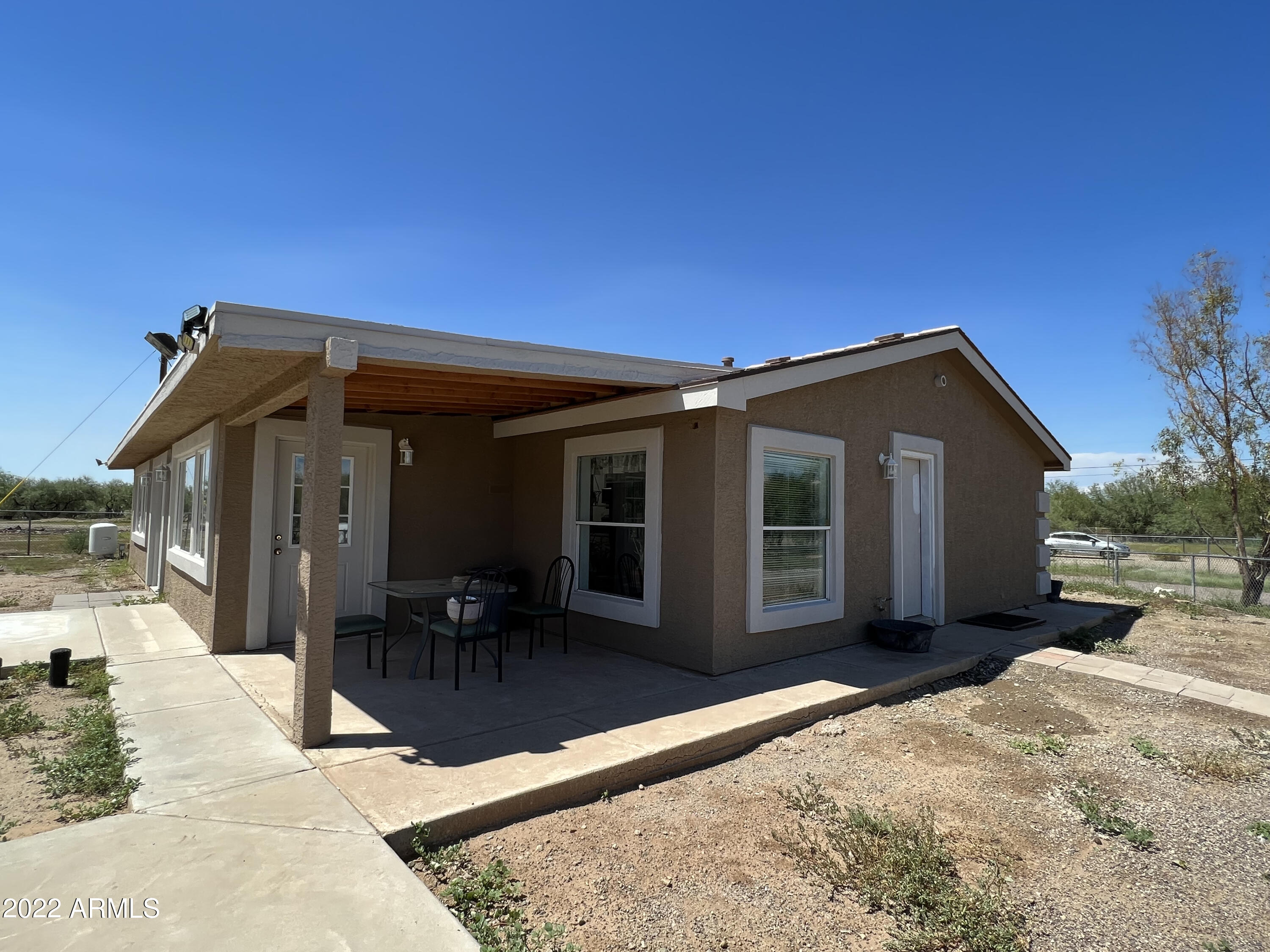 3231 West Elliot Road Laveen, AZ 85339 - Photo 8 of 59 Covered patio on east end of home