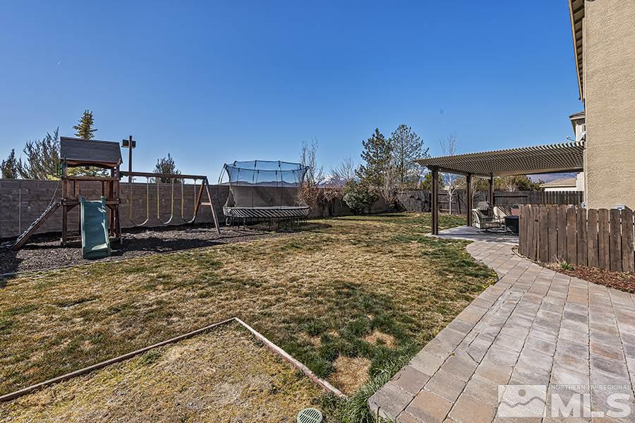 1630 Silver Thread Drive Reno, NV 89521 - Photo 16 of 17 a view of a terrace with a bench