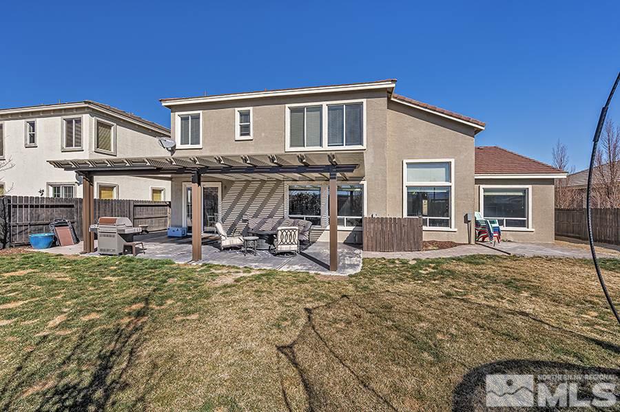 1630 Silver Thread Drive Reno, NV 89521 - Photo 17 of 17 a view of a house with backyard porch and sitting area
