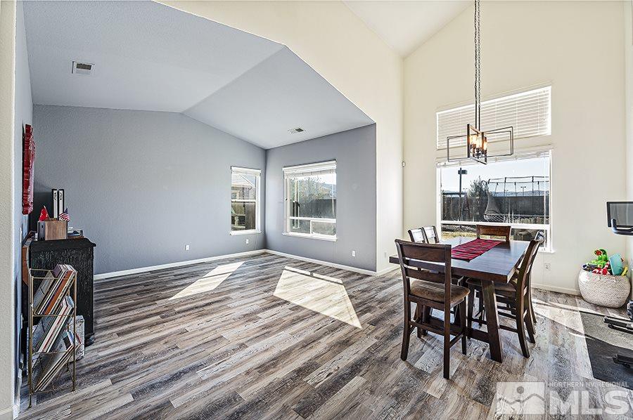 1630 Silver Thread Drive Reno, NV 89521 - Photo 3 of 17 a workspace room with furniture and wooden floor