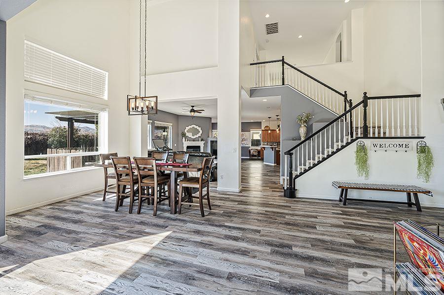 1630 Silver Thread Drive Reno, NV 89521 - Photo 4 of 17 a view of a dining room with furniture window and wooden floor
