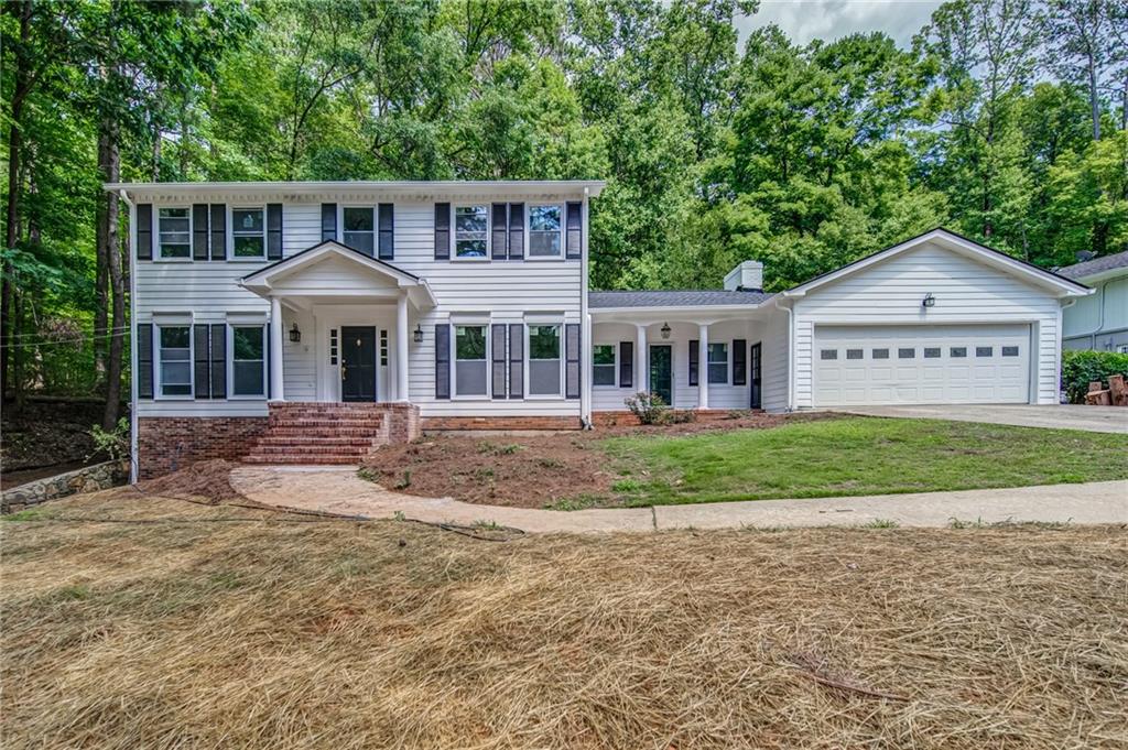 3670 High Point Lane Southwest Atlanta, GA 30331 - Photo 1 of 1 a front view of a house with a yard