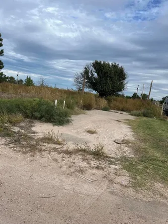 a view of a beach and a yard