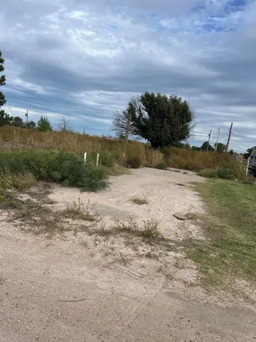 a view of a beach and a yard