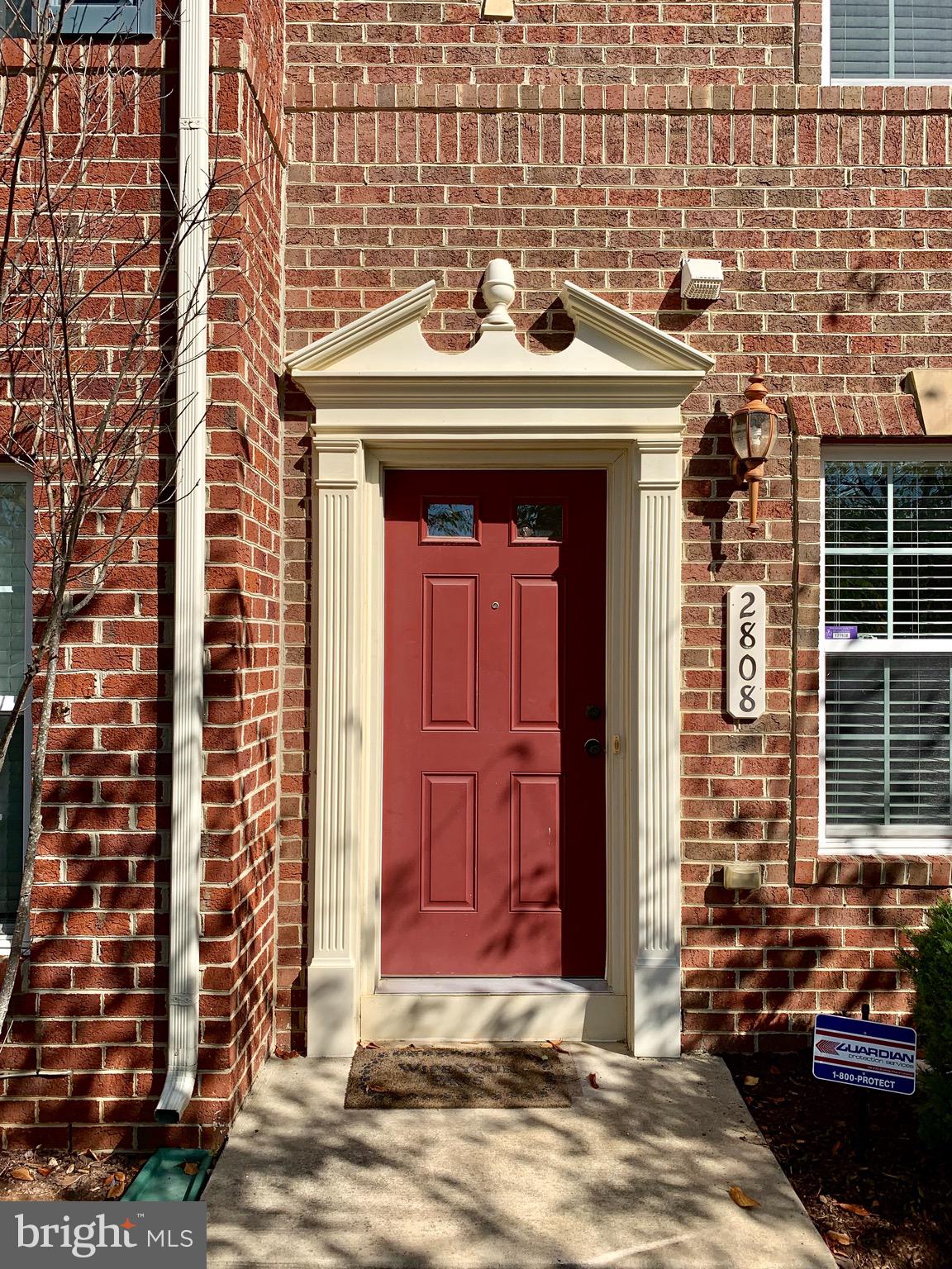 FRONT DOOR LEADS TO LOWER LEVEL FAMILY & HALF BATH