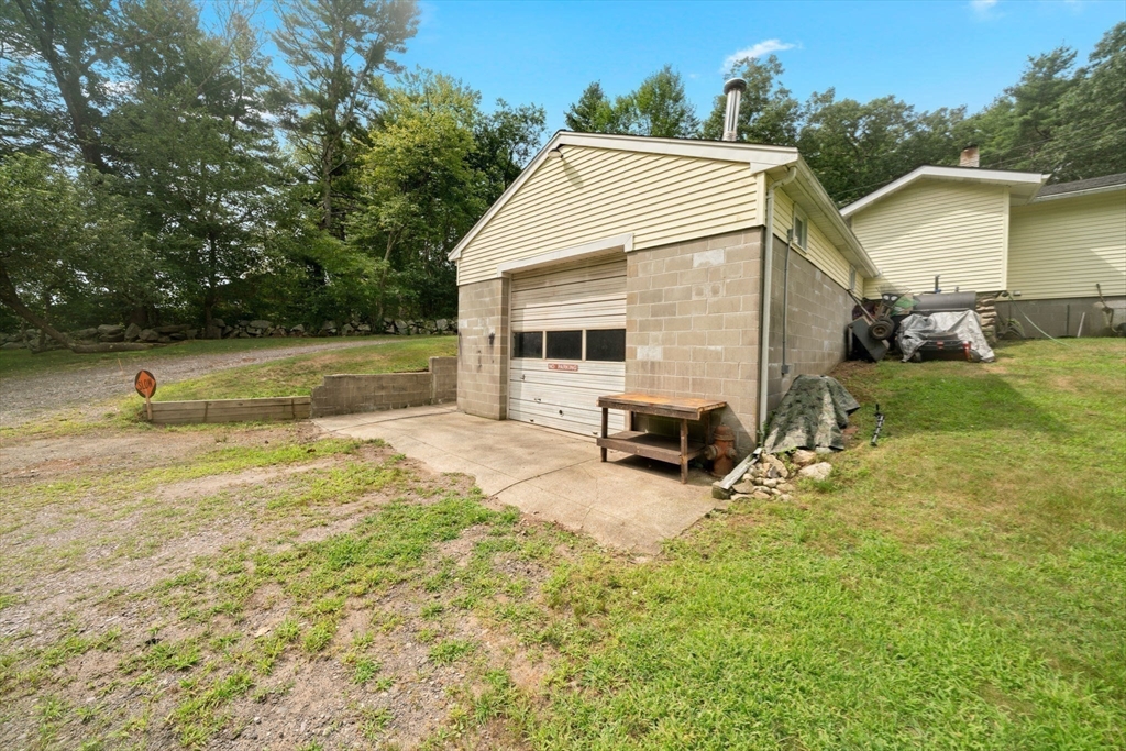 756 Snipatuit Road Rochester, MA 02770 - Photo 26 of 30 a view of a house with a yard and sitting area