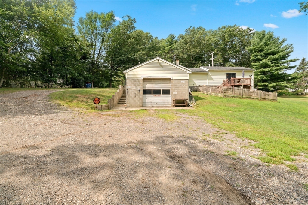 756 Snipatuit Road Rochester, MA 02770 - Photo 28 of 30 a view of a house with a yard