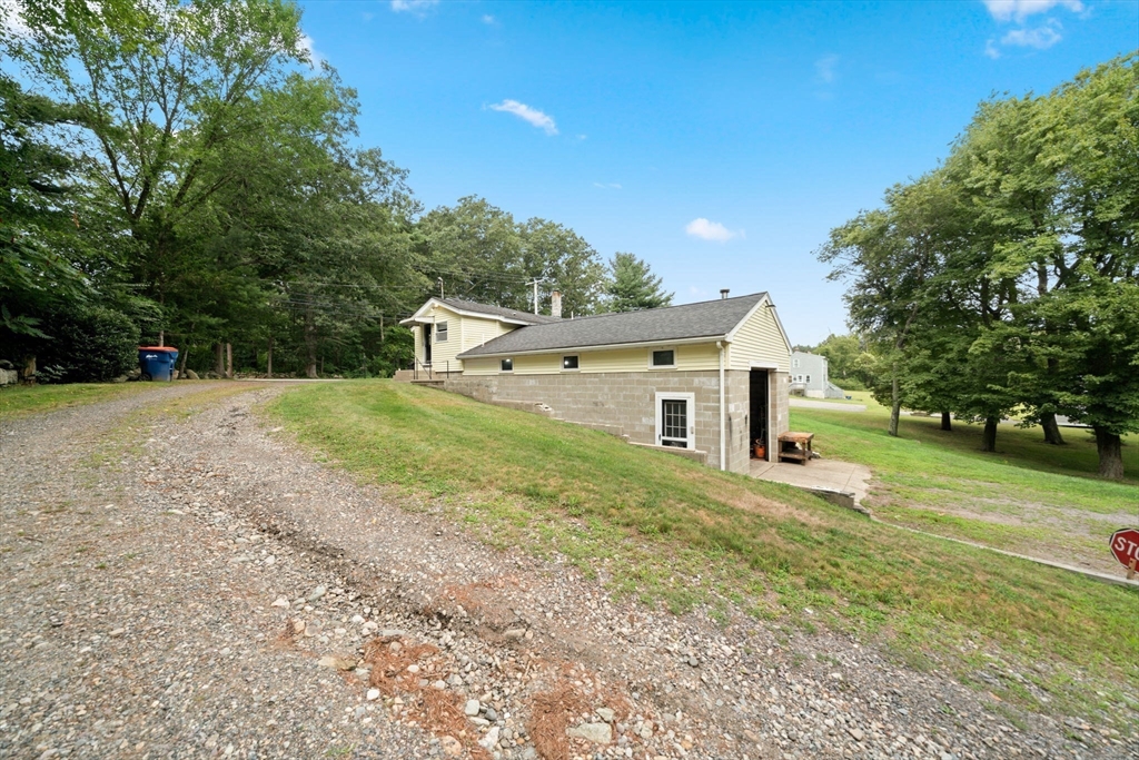 756 Snipatuit Road Rochester, MA 02770 - Photo 30 of 30 a house view with a backyard space