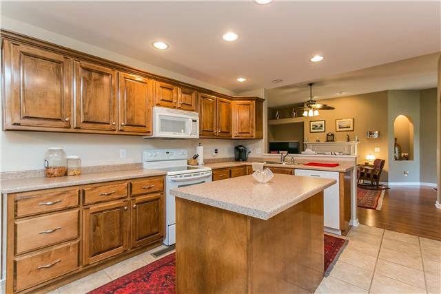 817 Oslo Road Mount Juliet, TN 37122 - Photo 6 of 17 a kitchen with a sink cabinets and wooden floor