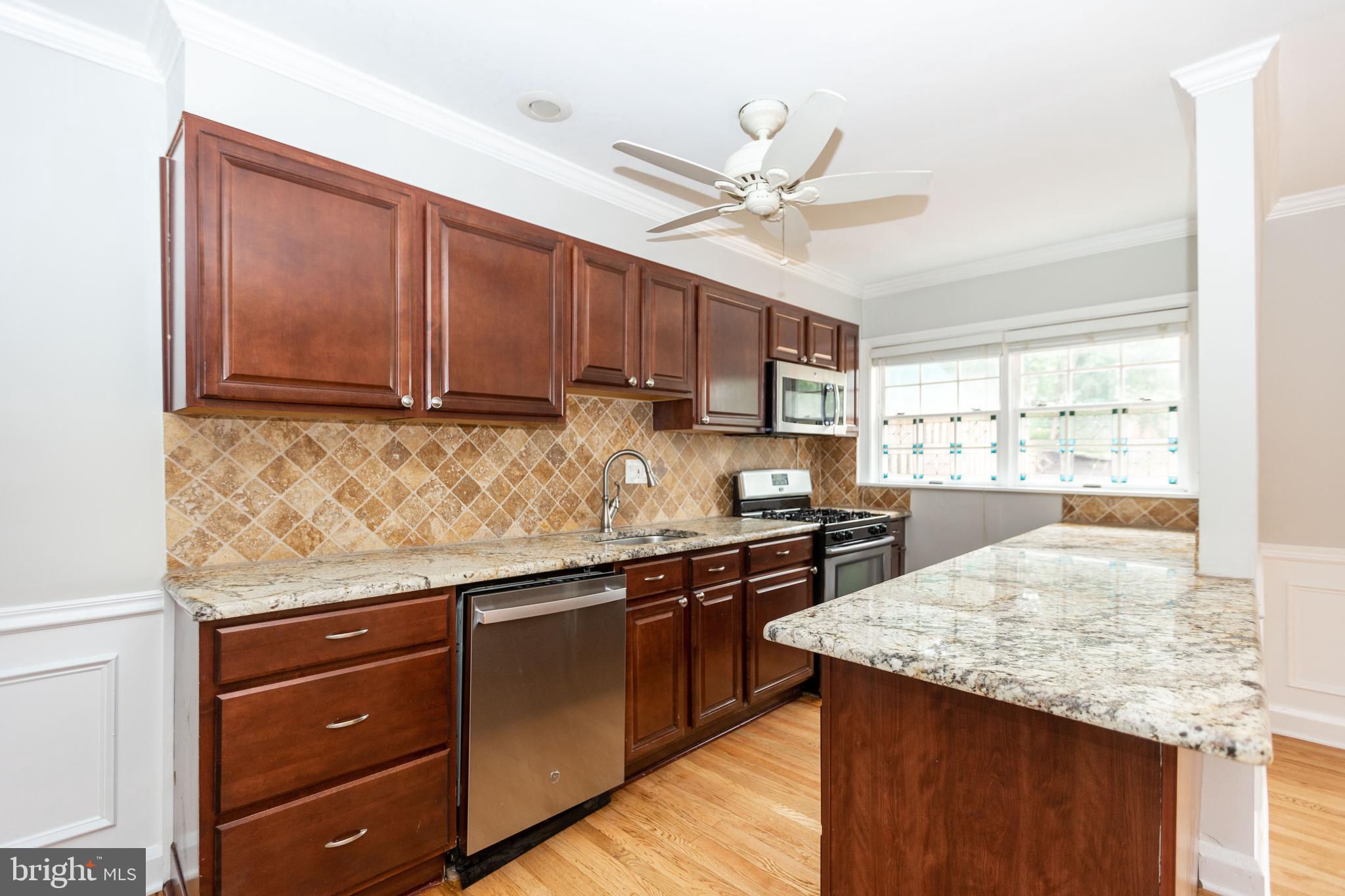 173 Dumbarton Road Baltimore, MD 21212 - Photo 12 of 41 Kitchen with ample light and ceiling fan