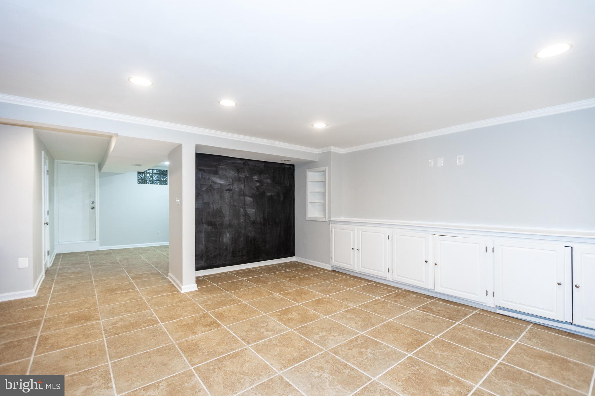 173 Dumbarton Road Baltimore, MD 21212 - Photo 17 of 41 Lower level features tile flooring throughout