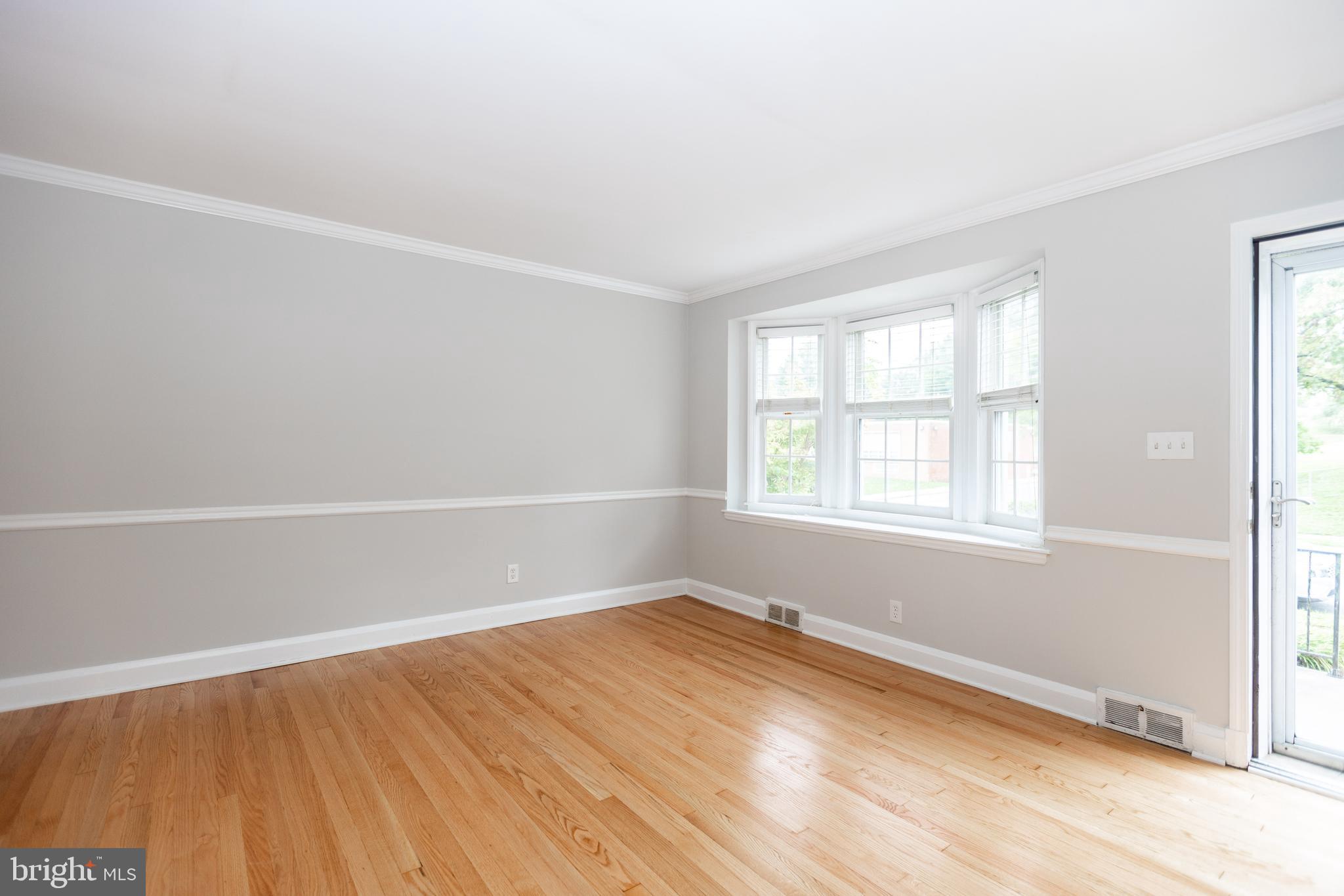 173 Dumbarton Road Baltimore, MD 21212 - Photo 3 of 41 Main level with original wood floors throughout