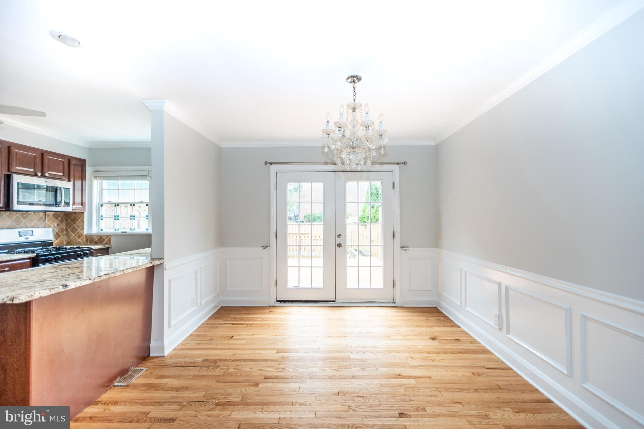 173 Dumbarton Road Baltimore, MD 21212 - Photo 7 of 41 Dining room with french doors to rear deck
