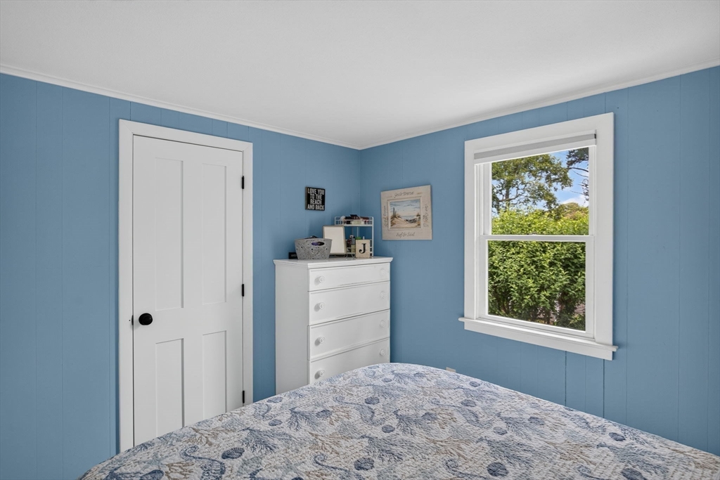 50 Pine Ridge Road Chatham, MA 02633 - Photo 25 of 42 a bedroom with a bed and a window