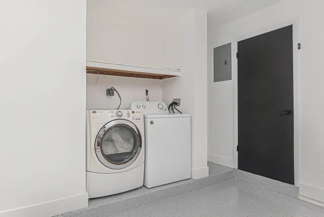 a utility room with dryer and washer