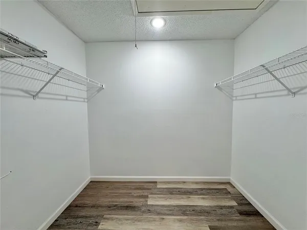 a view of room with hardwood floor
