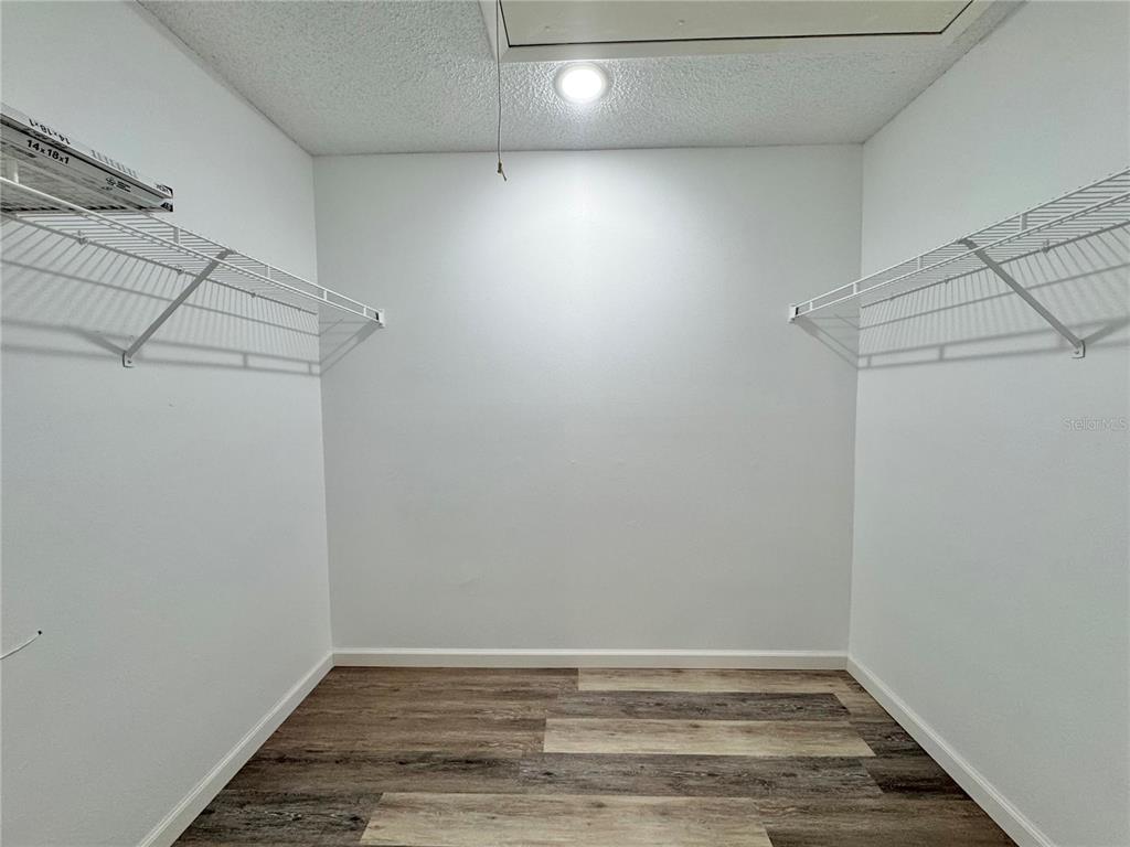 383 Winter Ridge Boulevard, Unit 383 Winter Haven, FL 33881 - Photo 17 of 35 a view of room with hardwood floor