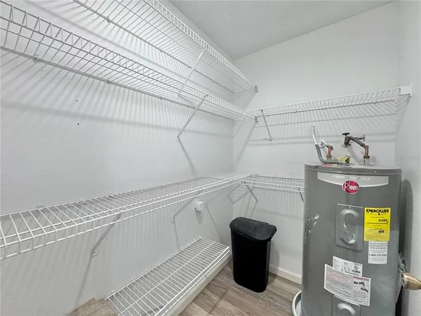 a view of storage and utility room