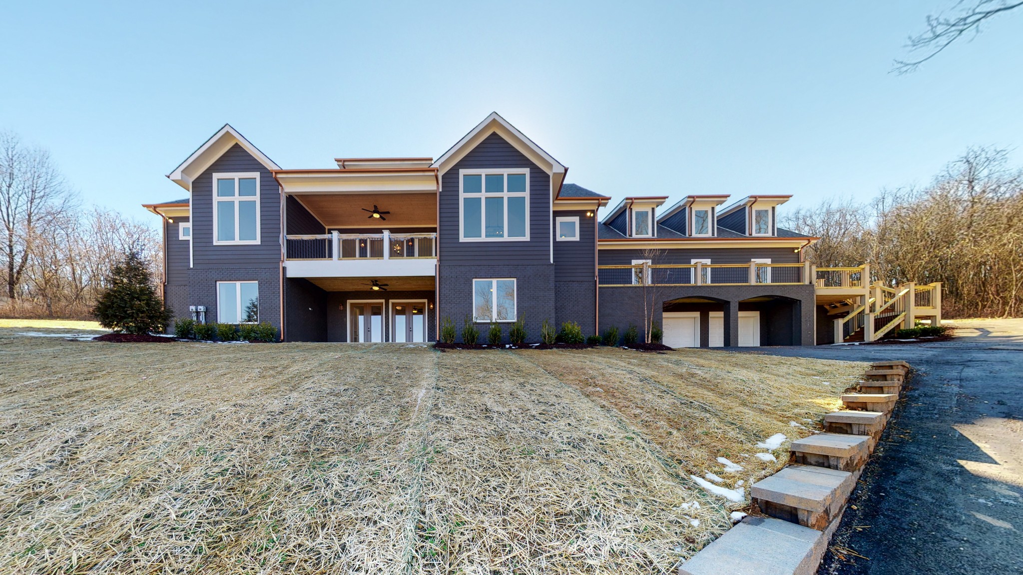 a front view of residential houses with yard