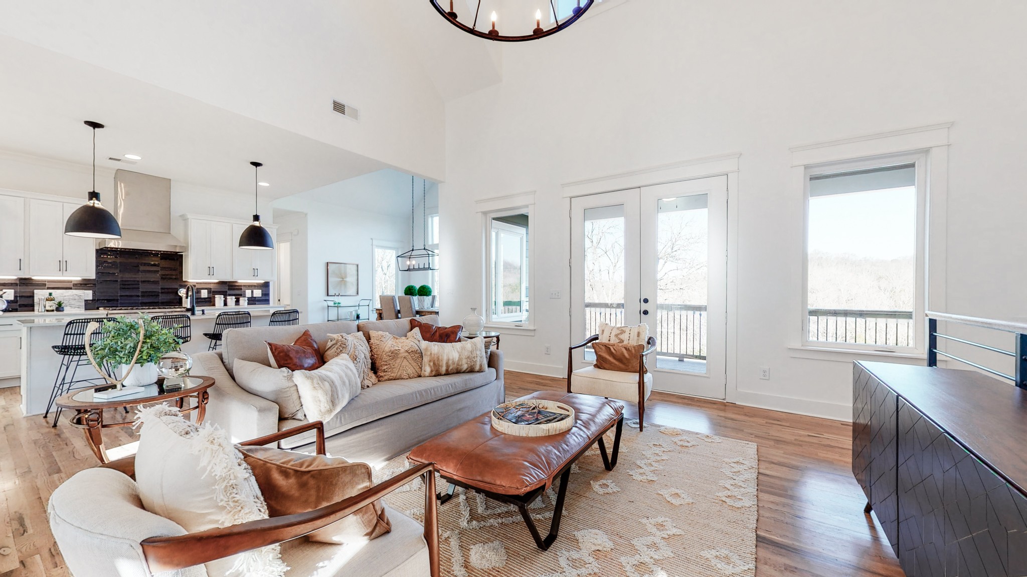 6720 Lane Road College Grove, TN 37046 - Photo 15 of 49 a living room with furniture a wooden floor and a large window