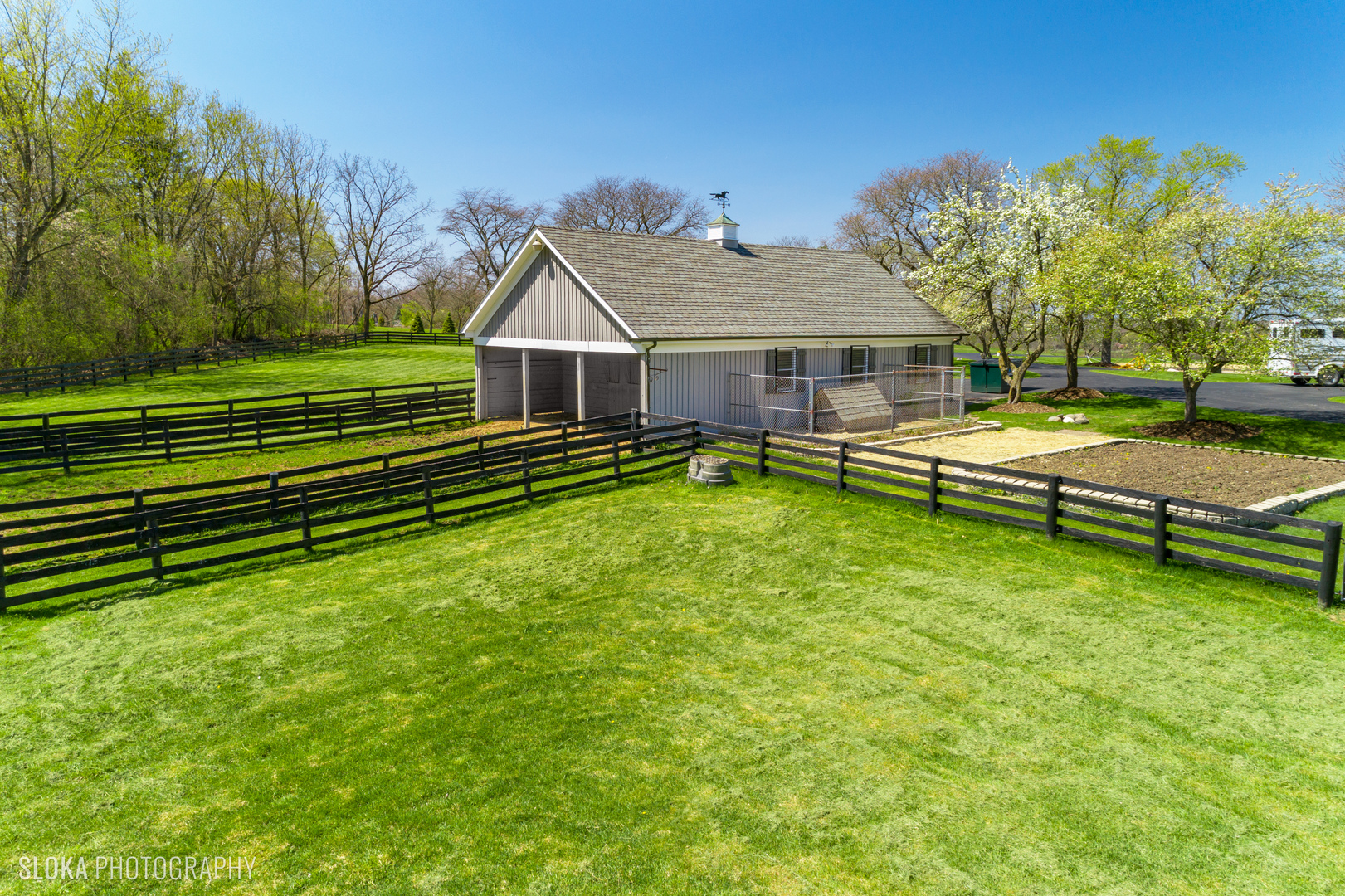 130 Brinker Road Barrington, IL 60010 - Photo 54 of 64 an aerial view of a house with a yard table and chairs