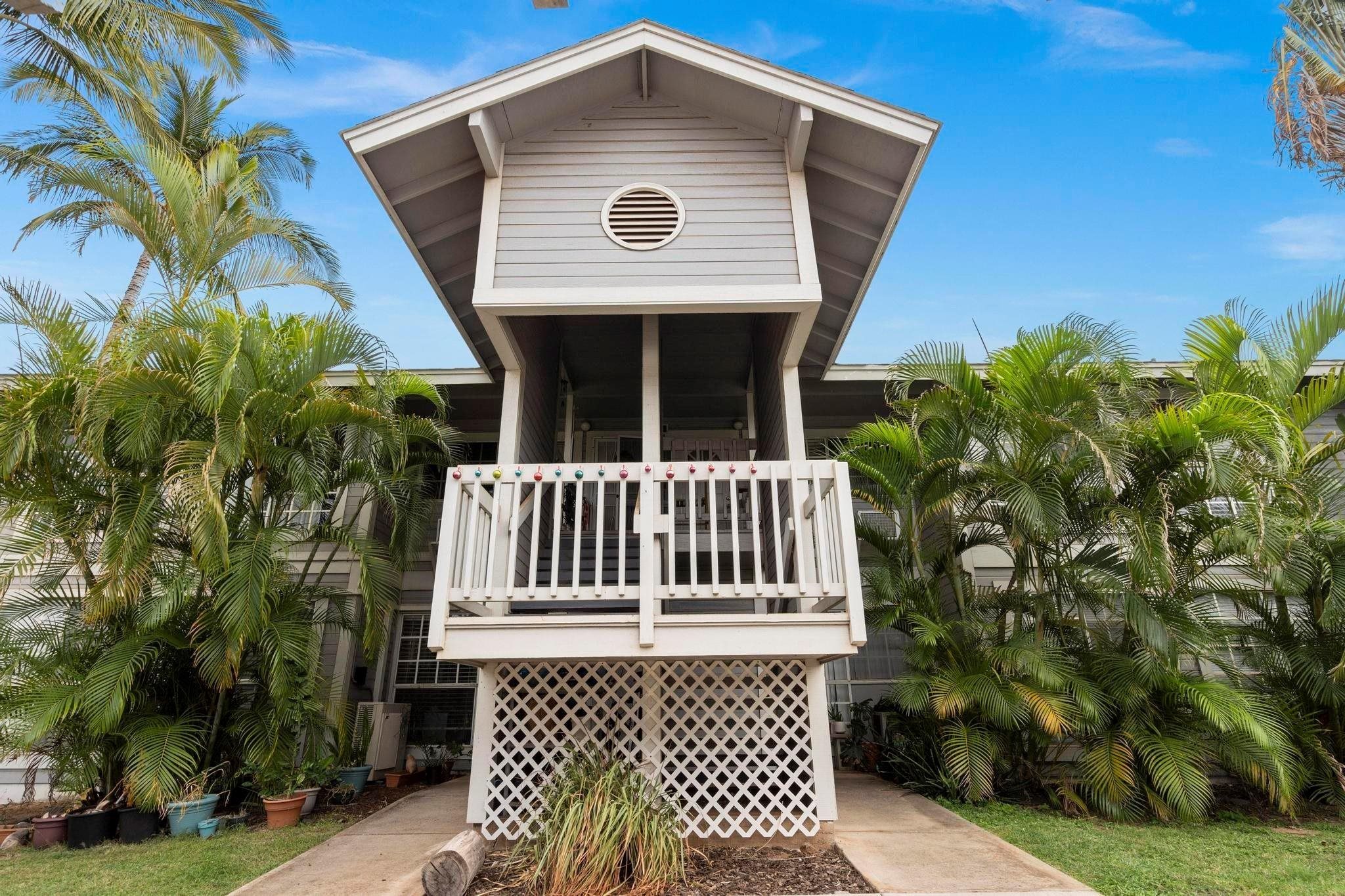 160 Keonekai Road, Unit 14202 Kihei, HI 96753 - Photo 16 of 21 a front view of a house with a yard