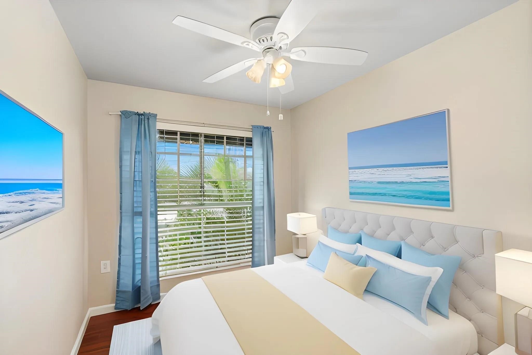 160 Keonekai Road, Unit 14202 Kihei, HI 96753 - Photo 5 of 21 a bedroom with a bed and a window