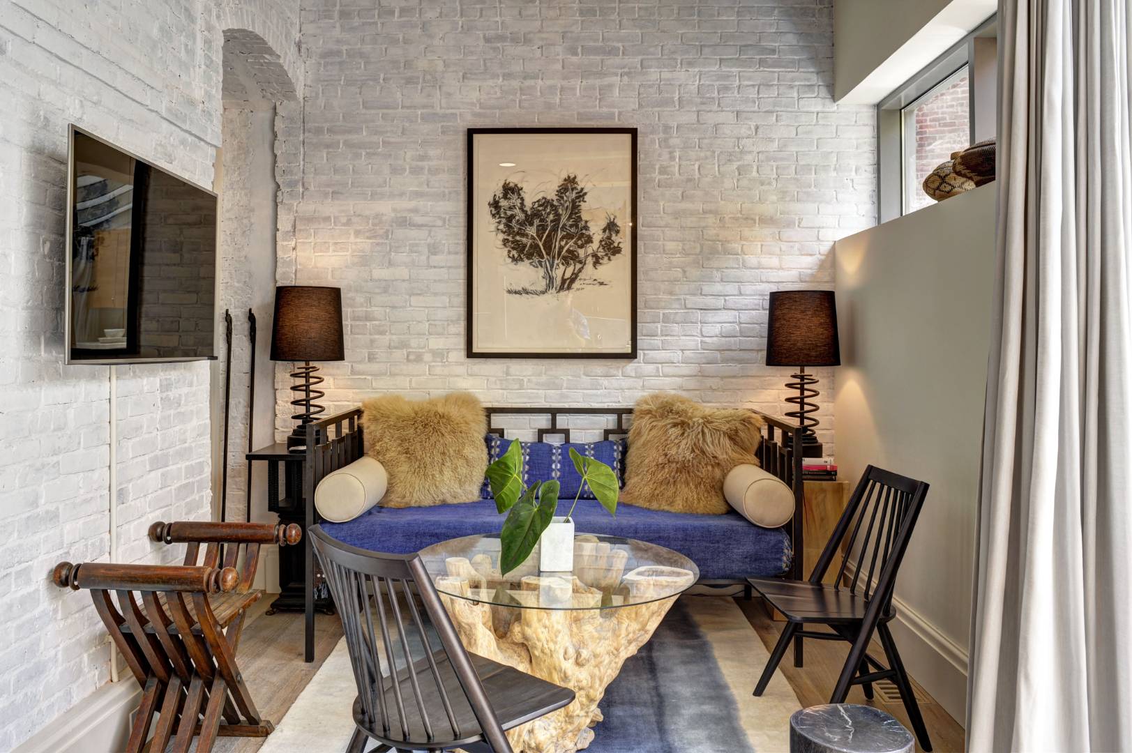 15 Church Street, Unit G106 Sag Harbor, NY 11963 - Photo 4 of 18 a view of a dining room with furniture
